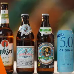 Helles Bier Marken: Flaschen und Dose mit hellen Biersorten wie Tegernseer Hell, Augustiner Lagerbier Hell und Helles 5.0.