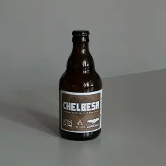 Eine braune Flasche mit dem Etikett "CHELBESA Berliner Weiße mit Cold Brew Coffee". Eine von vielen spannenden Berliner Weisse Sorten.